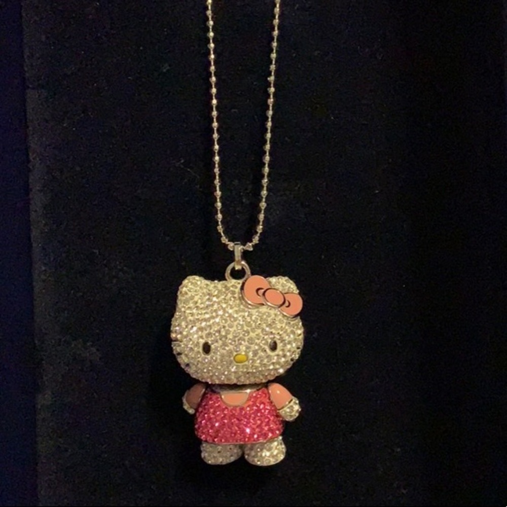 Authentic Swarovski Crystal hello kitty necklace.